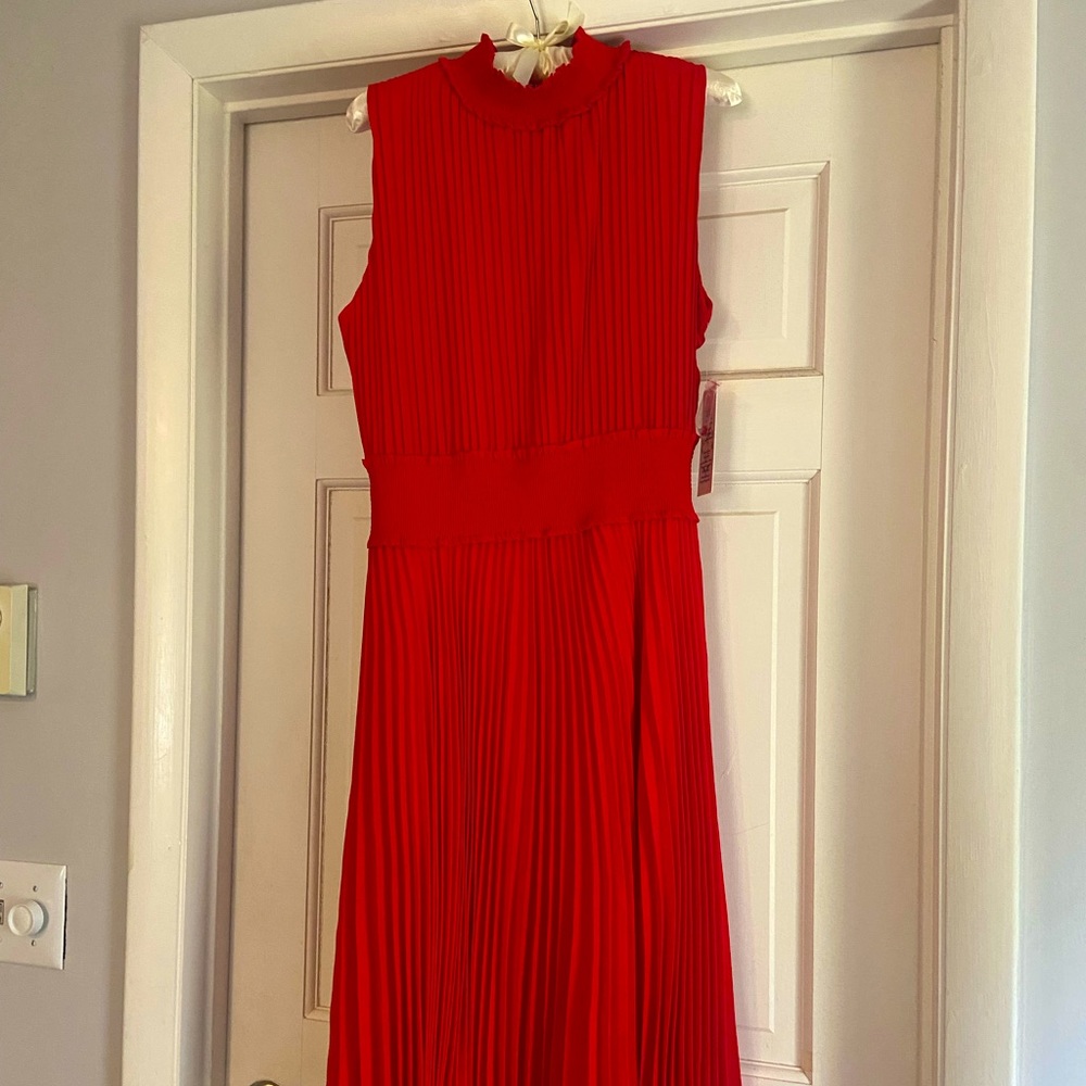 Size 12 red pleated dress. New with tags.